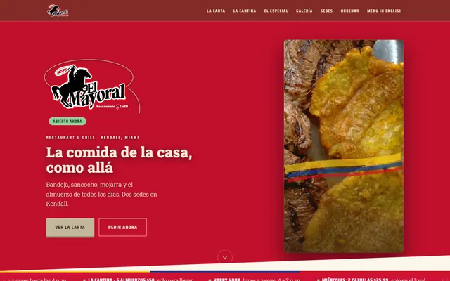 Portada de elmayoralrestaurants.com en escritorio: el logo de El Mayoral, «La comida de la casa, como allá» y una foto de un plato.